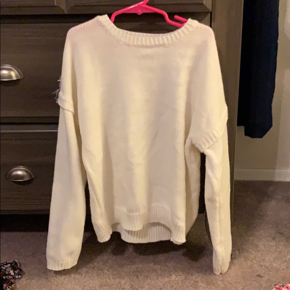 Girls size 10 fringe back sweater cream